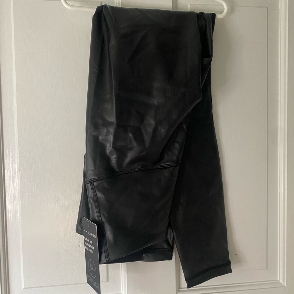 black shiny leather leggings